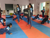 The Abhaya Training Center in Kolar has successfully trained 54 adolescent girls and 10 children in self-defense, martial arts, and fitness, focusing on building discipline, physical endurance, and technical expertise. Through defensive stances, counterattack drills, footwork variations, and partner-based practice routines, participants have demonstrated improved coordination, balance, and calmness under pressure, preparing them for competitive tournaments. Additionally, self-defense and martial arts programs were conducted in three schools—Kyasambhalli, Karadugur, and Jakkarasanakuppa—benefiting 252 girls and 80 boys. The training emphasized balance drills, reflex development, blocking techniques, step patterns, and controlled sparring exercises, helping students enhance agility, confidence, and preparedness for real-life situations. Strong collaboration with teachers has ensured consistent and impactful training delivery, fostering resilience, teamwork, and determination among participants.